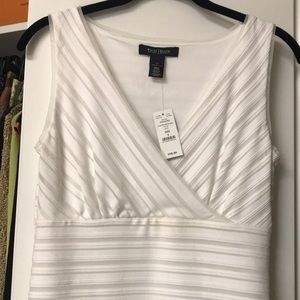 White sleeveless V neck